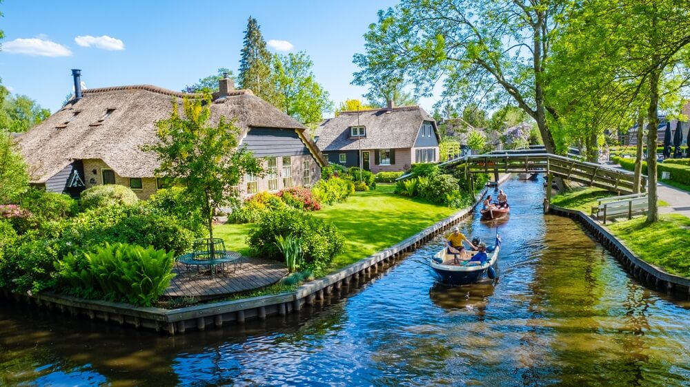 Little boats in giethoorn holland on a guided bike trip to Groningen with the Iris barge